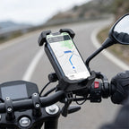 Phone mount holding a phone with navigation on a motorcycle